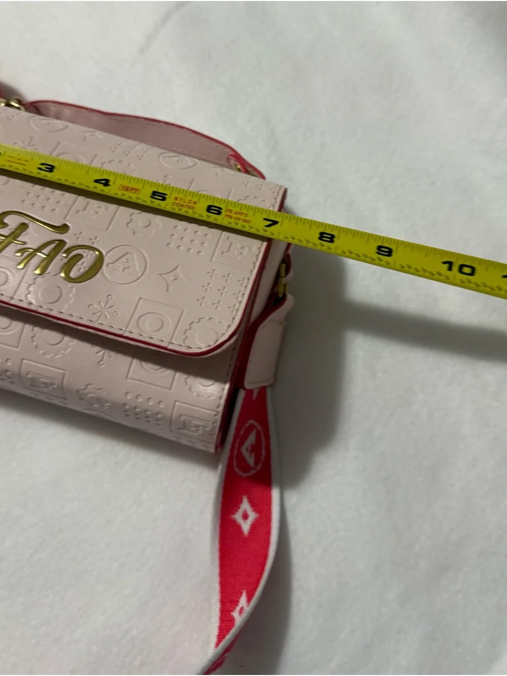 FAO Schwarz Blush Pink Embossed Crossbody Bag Red Strap Frog Hand Puppet